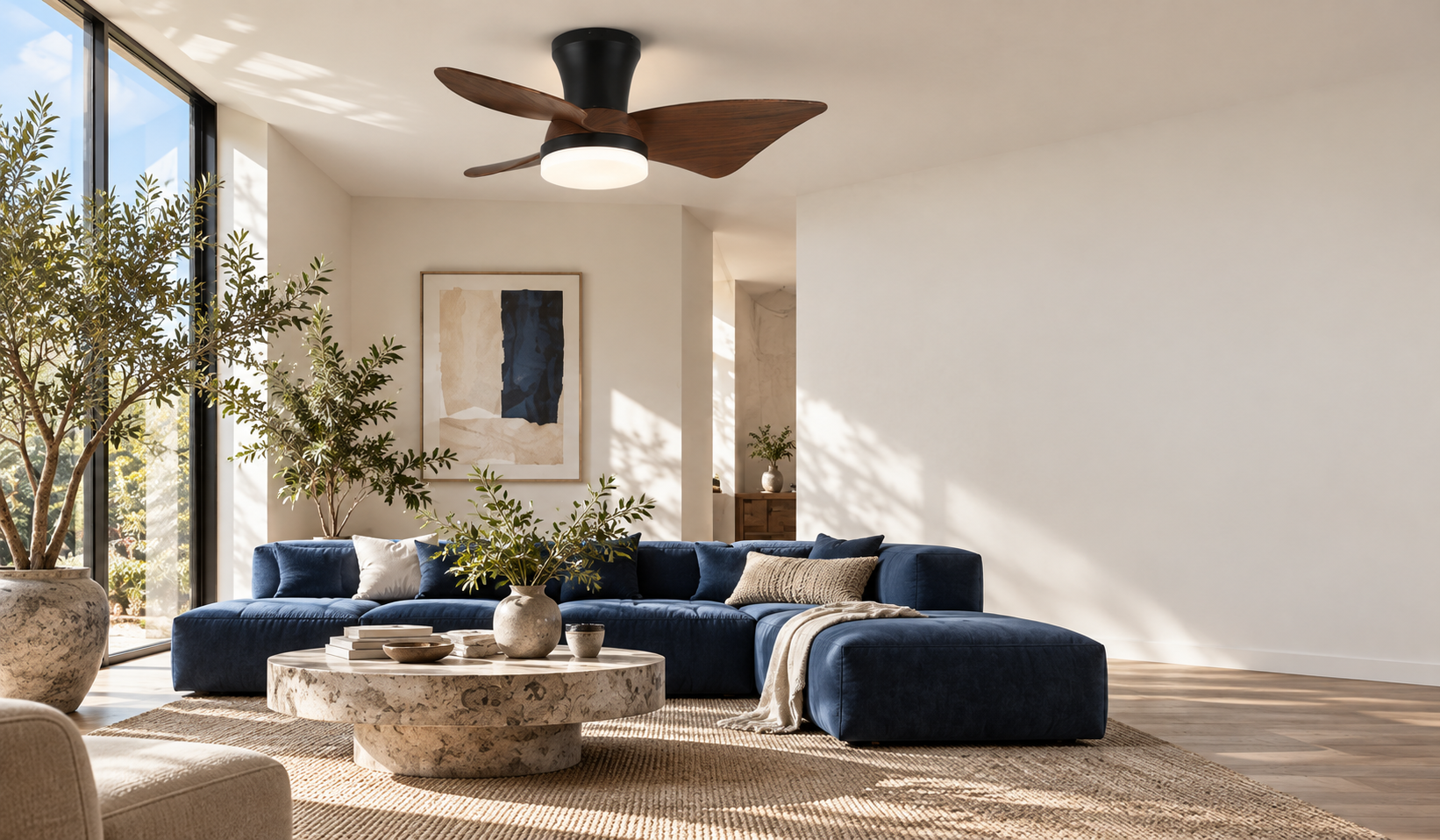Room inspiration: Zephyr Curve above a blue sofa in a sunlit living room